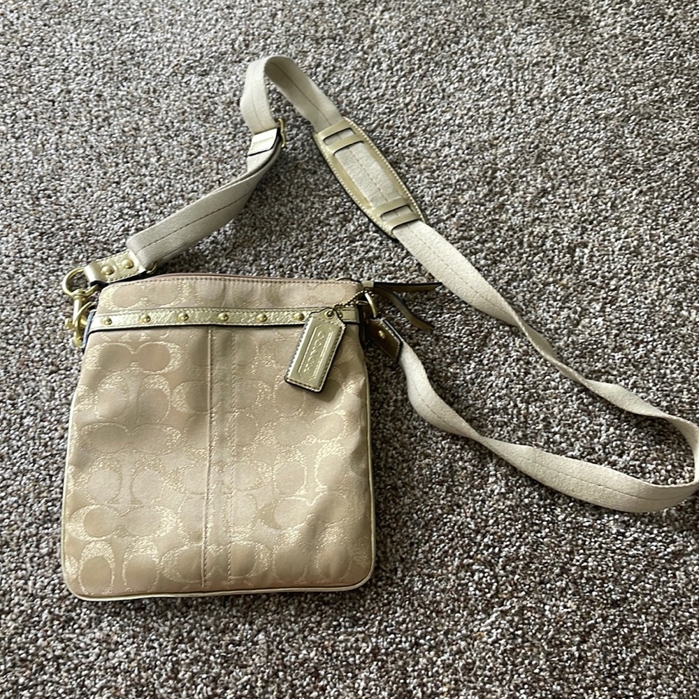 Gold coach cross body bag